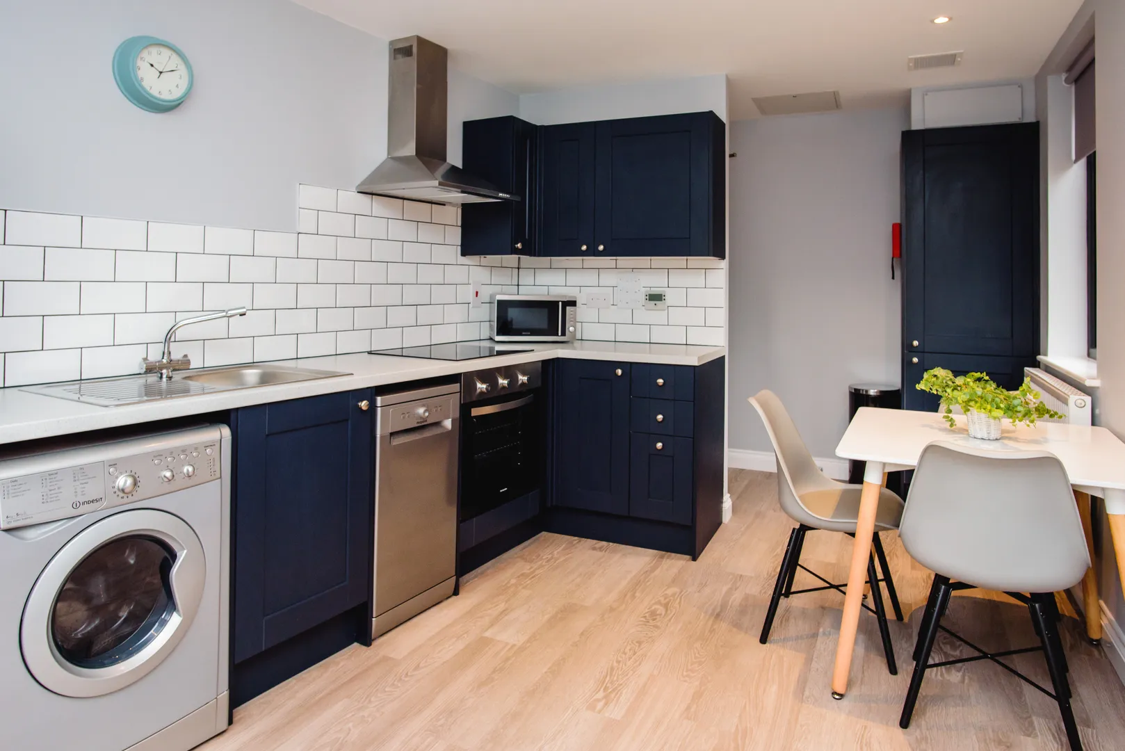 Modern Kitchen with Navy Cabinets