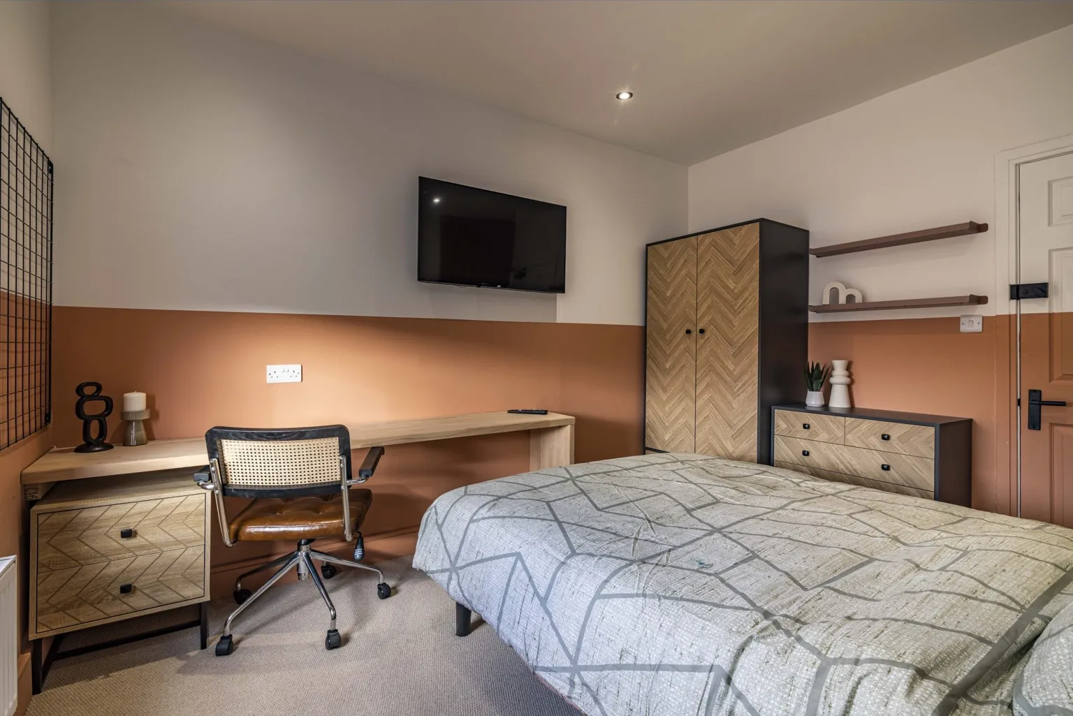 Contemporary student bedroom with built-in desk